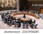 Small photo of Members of Security Council vote to adopt resolution during meeting concerning situation in Haiti at UN Headquarters in New York on July 14, 2023