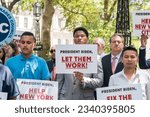 Small photo of Rally calling upon President Joe Biden to declare a state of emergency on migrant crisis in NYC held in City Hall Park in New York on July 31, 2023