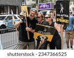 Small photo of Griffin Dunne, Samantha Mathis join WGA and SAG-AFTRA members to walk picket lines as they strike over contract negotiation at Netflix and Warner Bros. Discovery offices in New York on August 14, 2023