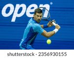 Small photo of Novak Djokovic of Serbia returns ball during 4th round against Borna Gojo of Croatia at the US Open Championships at Billie Jean King Tennis Center in New York on September 3 2023