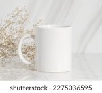 Small photo of 15 oz white ceramic coffee mug mockup, Empty mug mock up for design promotion.