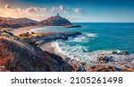Small photo of Superb sunrise on popular tourist destination - Acropoli di Bithia with Torre di Chia tower on background. Spectacular morning view of Sardinia island, Italy, Europe. Traveling concept background