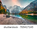 Popular photographers attraction of Braies Lake. Colorful autumn landscape in Italian Alps, Naturpark Fanes-Sennes-Prags, Dolomite, Italy, Europe. Beauty of nature concept background.