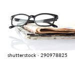 Glasses On Newspapers