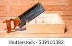 Small photo of Woodworkers backsaw with dust and sawdust