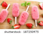 Homemade ice cream pops with fresh berries