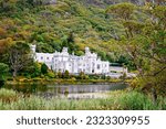 Small photo of Kylemore Abbey with water reflections in Connemara, County Galway, Ireland, Europe. Benedictine monastery founded 1920 on the grounds of Kylemore Castle. Mainistir na Coille Moire.