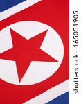 Small photo of The flag of North Korea was adopted on 8 September 1948, as the national flag and ensign of this isolationist Stalinist state.