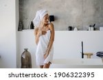 Female model in white towel. Women, beauty and hygiene concept.