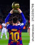 Small photo of BARCELONA - DEC 7: Messi holds up his sixth Ballon d'Or prior to the the La Liga match between FC Barcelona and RCD Mallorca at the Camp Nou Stadium on December 7, 2019 in Barcelona, Spain.
