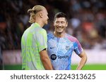 Small photo of BARCELONA - AUG 24: Haaland (L) and Lewandowski (R) talk prior the friendly match between FC Barcelona and Manchester City at the Spotify Camp Nou Stadium on August 24, 2022 in Barcelona, Spain.