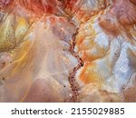 Small photo of Red colorful mountains in Altai, Siberia, Russia. Aerial top down view. Kyzyl-Chin valley, also called as Mars valley. Abstract nature background