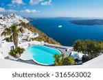 White architecture on Santorini island, Greece. Beautiful landscape with sea view.