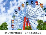 Giant Ferris Wheel Against Blue ...
