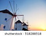Row Of Windmills In Front Of A...