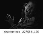 Small photo of Conceptual image : mental health, stress, depression, panic attacks and anxiety in children. Psychological portrait of nervous and overexcited young girl screams for help. Body language.