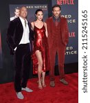 Small photo of LOS ANGELES - NOV 03: Gal Gadot, Dwayne Johnson and Ryan Reynolds arrives for Netflix’s ‘Red Notice’ Premiere on November 03, 2021 in Los Angeles, CA