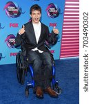 Small photo of LOS ANGELES - AUG 13: Micah Fowler arrives for the Teen Choice Awards 2017 on August 13, 2017 in Los Angeles, CA