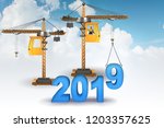 heavy crane lifting numbers in... | Shutterstock . vector #1203357625
