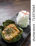 Small photo of traditional Cambodian khmer fish amok curry meal