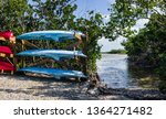 Florida Keys Canoe Launch:  Rental canoes and kayaks wait beside a launch area in Long Key State Park.
