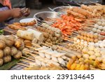 Small photo of cookshop in Bangkok, Thailand, with various skewers and other meat