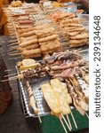 Small photo of cookshop in Bangkok, Thailand, with various skewers and other meat