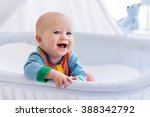 Funny Baby In White Crib With...