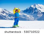 Child Skiing In Mountains....