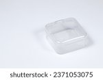 Empty small transparent plastic box isolated on white background.