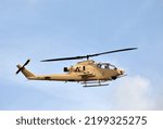 Side view of Vietnam War era American helicopter seen in flight