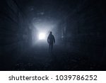 Man In A Dark Concrete Tunnel...