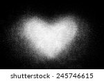 Freeze motion of  white powder isolated on black dark background. Abstract design of dust cloud. Particles heart shaped explosion screensaver, wallpaper with copy space. Love, passion, care concept