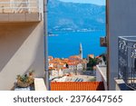 Panoramic view from balcony of Budva old town Montenegro . Famous beach at Adriatic Sea 