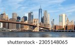 Small photo of New York City skyline of Manhattan with Brooklyn Bridge and World Trade Center skyscraper panorama traveling in the United States