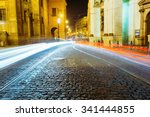 Night View of traffic lights in street in Prague, Czech Republic.