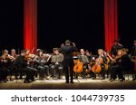 Small photo of DNIPRO, UKRAINE - MARCH 12, 2018: FOUR SEASONS Chamber Orchestra - main conductor Dmitry Logvin perform at the State Drama Theatre.