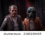 Small photo of JULY 18 2022: Star Wars scum and villainy. thugs Ponda Baba and Doctor Cornelius Evazan causing trouble outside of a spaceport tavern. He doesn't like you - Hasbro action figures