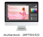 Editing and retouching photo on  desktop computer