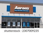 Small photo of Indianapolis - Circa May 2023: Aaron's Rent to Own retail store. Aaron's allows people to rent electronics and furniture with an option to purchase.
