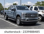 Small photo of Kokomo - July 30, 2023: Ford F-250 Super Duty Crew Cab display at a dealership. Ford offers the F250 in utility service models.