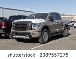 Small photo of Lafayette - November 16, 2023: Nissan Titan in dealer prep. Nissan offers the Titan in King Cab and Crew cab models.