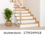 Modern natural ash tree wooden stairs in new house interior