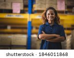 Portrait of African American worker in warehouse, International export business concept