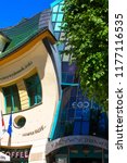 Small photo of SOPOT, POLAND - JUNE 6, 2018: Krzywy Domek ( crooked little house ) at Monte Cassino Street. It is an unusually shaped building, built in 2004