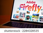 Small photo of ITALY - April 3, 2023: Adobe Firefly website displayed on computer mac laptop screen. Adobe has announced the beta release of its AI Art Generator tool.