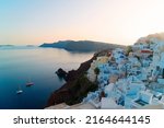 Small photo of beautiful details of Santorini island, sunset over Oia village coast line, Santorini island, Greece, pamorama with Aegan sea