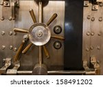 Locked bank vault door in retail store safe secure storage locker