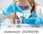 Small photo of Scientist holds fecal transplant caps in the lab. Witness the forefront of research aimed at revolutionizing healthcare and improving lives