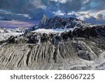 Small photo of Aiguille du Dru mountain in the Mont Blanc massif on the glacier Mer de Glace. French Alps, Europe.